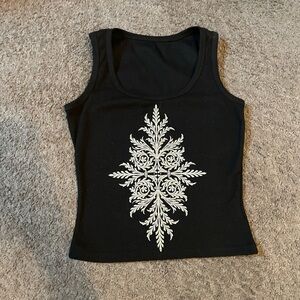 Black tank top with front design and a few rhinestones in design